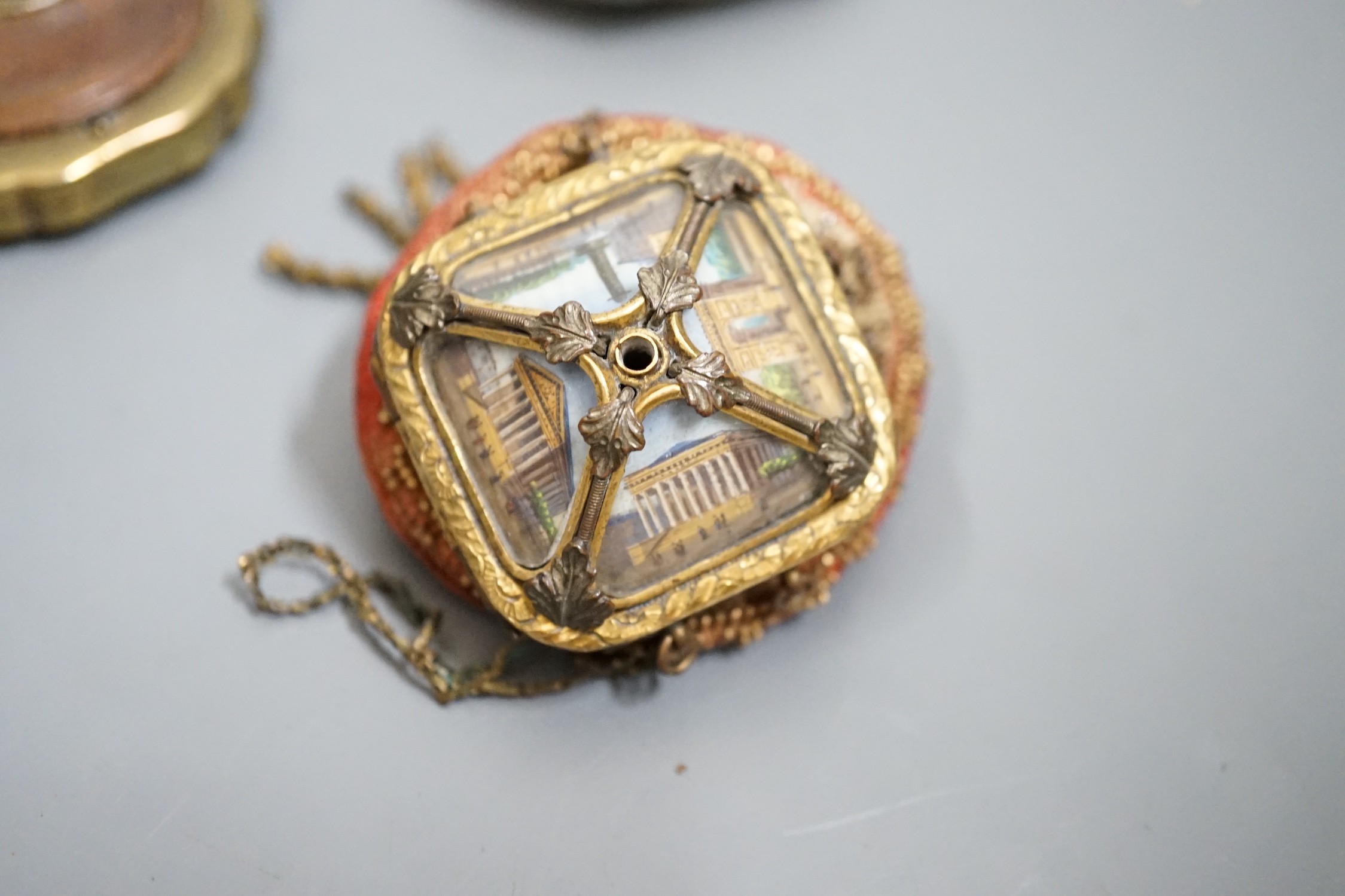 A 19th century Continental Royal commemorative purse and four Grand Tour souvenir purses